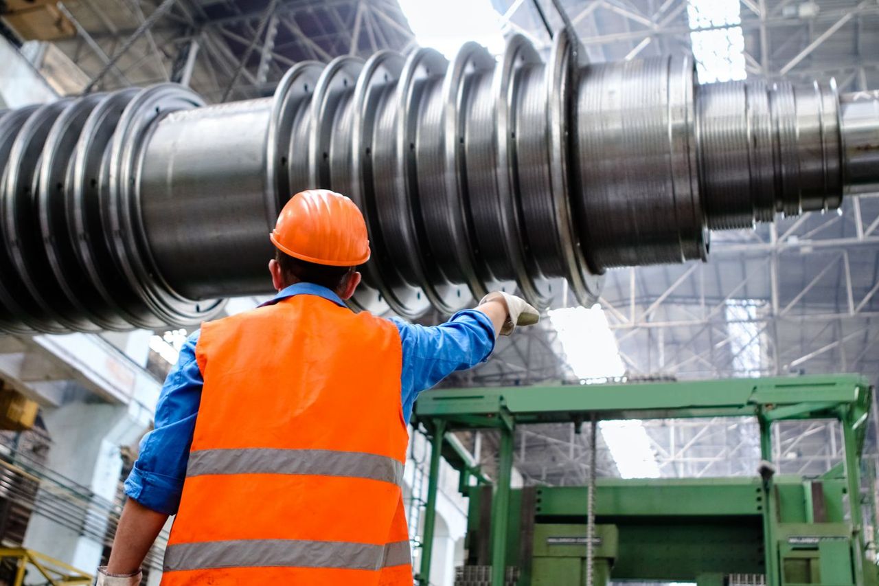 Industrial operations specialist at work in a manufacturing facility