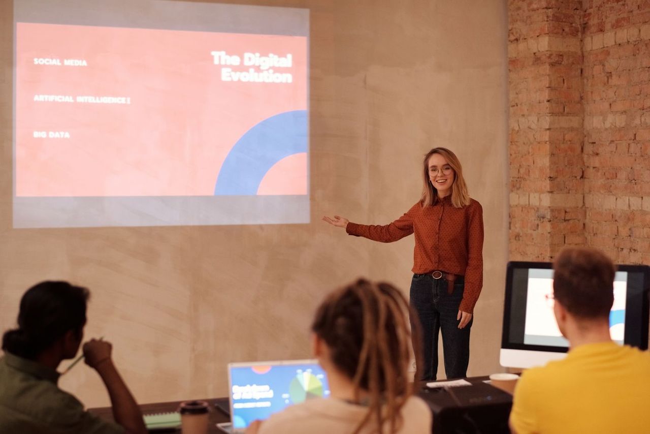 Industry expert presenting to an audience at a corporate session